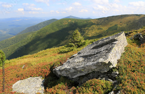 old stone on mountain top over valley