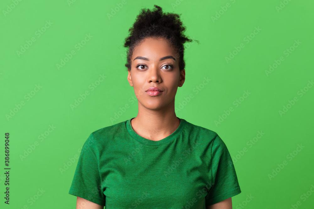 Close up portrait of afro lady looking at camera Close up portrait of afro lady looking at camera