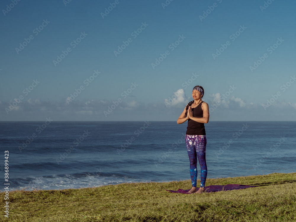 Yoga in front of the sea