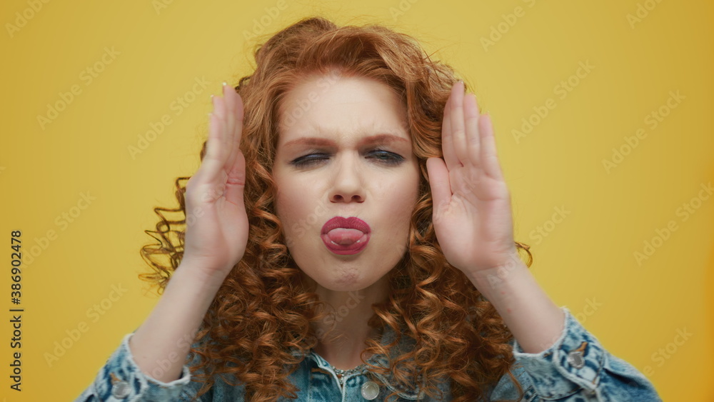 Emotional woman changing emotions on face with hands. Girl gesturing hands Emotional woman changing emotions on face with hands. Girl gesturing hands