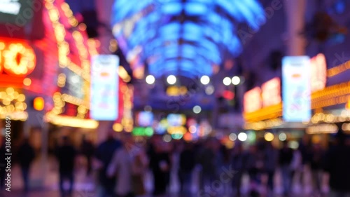 Defocused old fasioned electric lamps glowing at night. Abstract close up of blurred retro casino decoration shimmering, Las Vegas USA. Illuminated vintage style bulbs glittering on Freemont street. photo