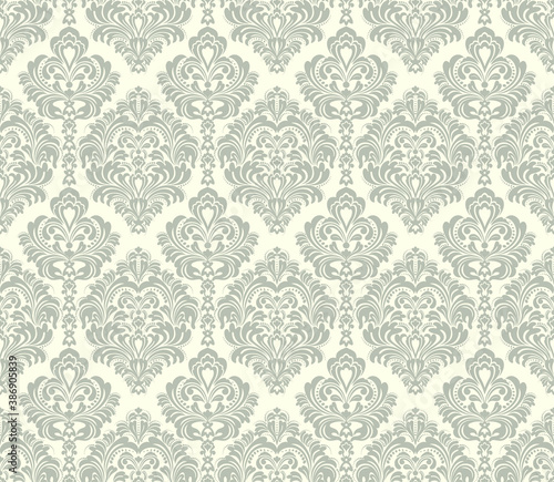 Seamless light background with brown pattern in baroque style. Vector retro illustration. Ideal for printing on fabric or paper for wallpapers, textile, wrapping. 