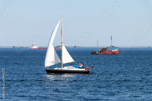 Danish sailing keelboat in Øresund strait photo
