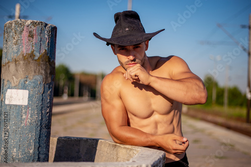 handsome muscular cowboy  man