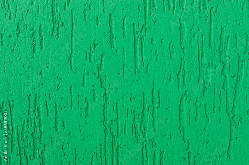 Green painted plaster wall background. Turquoise exterior finish surface. Creative wallpaper  website backdrop for design and text sign. Aqua color decorative texture.