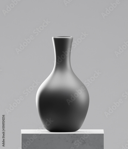 Black vase on cement table photo
