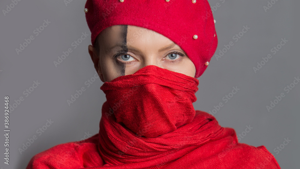 Portrait of a attractive pretty fashionable lovely girl wearing scarf mask for prevention virus isolated on grey background Portrait of a attractive pretty fashionable lovely girl wearing scarf mask for prevention virus isolated on grey background