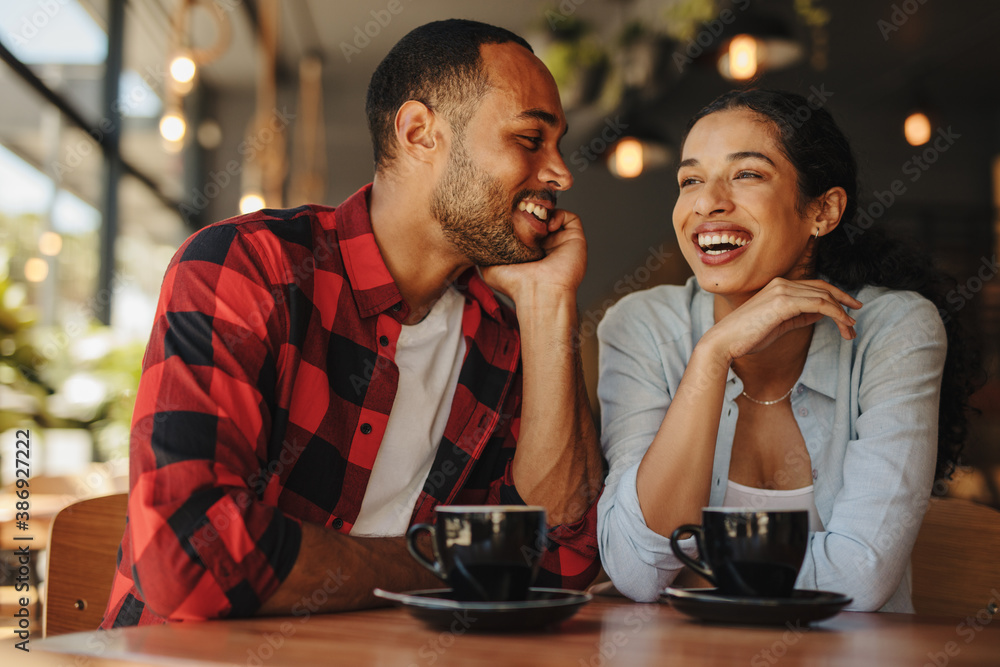 Beautiful couple at cafe