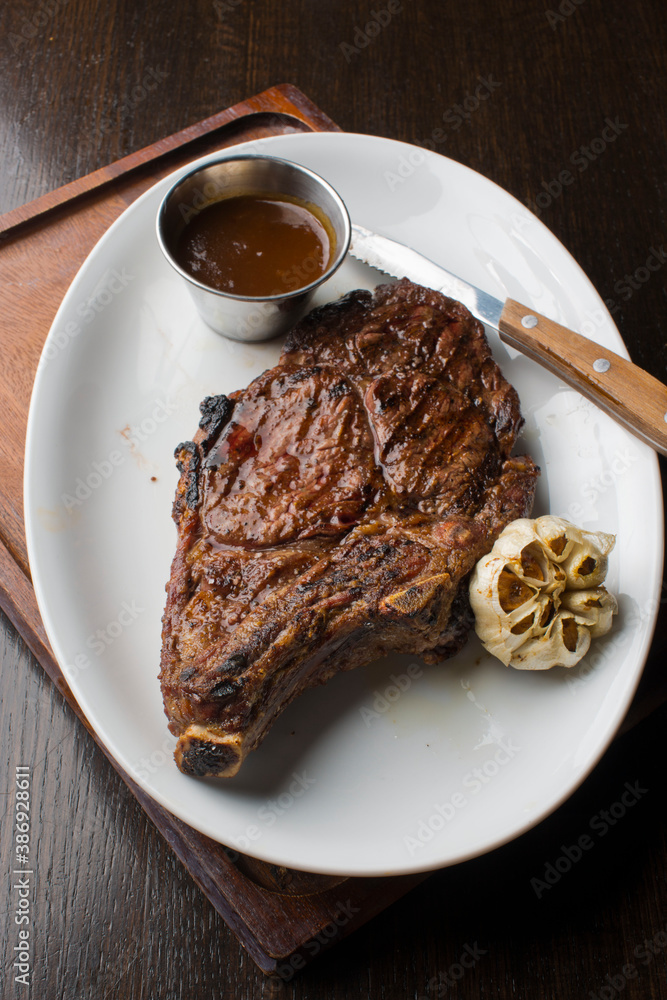 Steak. Grass-fed skirt steak, grilled to a medium rare and served with a garlic herb butter sauce and paired with roasted potatoes and Brussels sprouts. Classic American steakhouse favorite. Steak. Grass-fed skirt steak, grilled to a medium rare and served with a garlic herb butter sauce and paired with roasted potatoes and Brussels sprouts. Classic American steakhouse favorite.