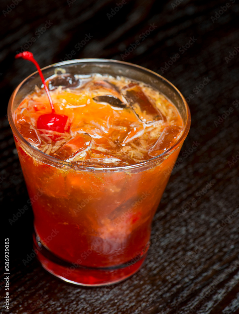 Cocktails. Traditional American drinks made by artisanal bartenders or mixologists in speakeasy & upscale bars or dives or taverns.Cocktails served in chilled cocktail glasses & garnished with fruit. Cocktails. Traditional American drinks made by artisanal bartenders or mixologists in speakeasy & upscale bars or dives or taverns.Cocktails served in chilled cocktail glasses & garnished with fruit.
