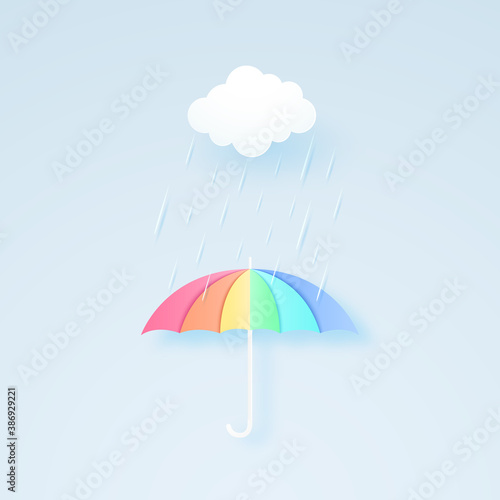 rainbow color umbrella with rain and cloud  rainy season  rainstorm  paper art style