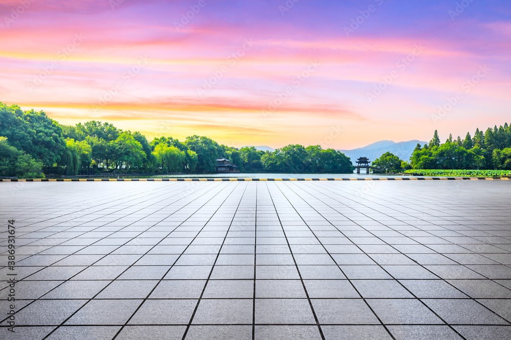 Empty square floor and green forest with pavilion in Hangzhou,China.