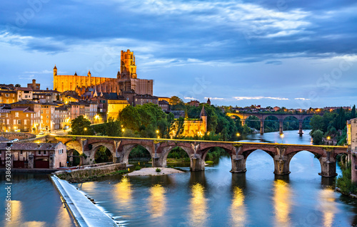 Albi featuring the Sainte-Cecile Cathedral and the Old Bridge over the river Tarn. UNESCO world heritage in France photo