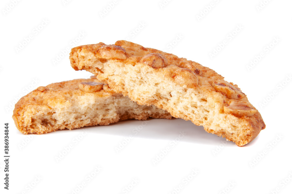 Tasty cookies with peanuts and honey baked isolated on the white Tasty cookies with peanuts and honey baked isolated on the white