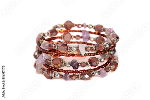 Beautiful natural amethyst bracelet isolated on white background. Side view