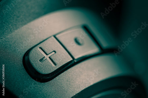 Closeup of a volume button on a headphone