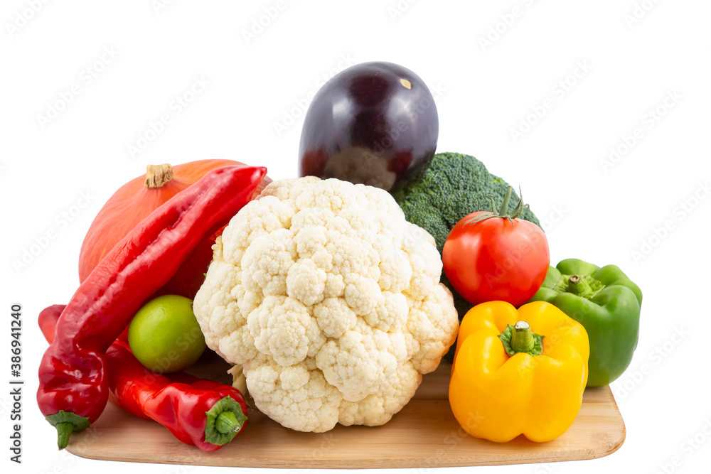 Group vegetables and Fruits Apples, grapes, oranges, pineapples, bananas in a wooden basket with carrots, tomatoes, guava, chili, eggplant, green salad on wooden table.Save with clipping path Group vegetables and Fruits Apples, grapes, oranges, pineapples, bananas in a wooden basket with carrots, tomatoes, guava, chili, eggplant, green salad on wooden table.Save with clipping path