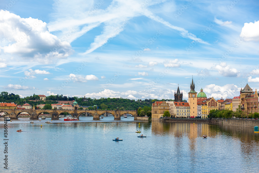 The landscape of the city of Prague view from the Vltava river on the ancient architecture of the city The landscape of the city of Prague view from the Vltava river on the ancient architecture of the city