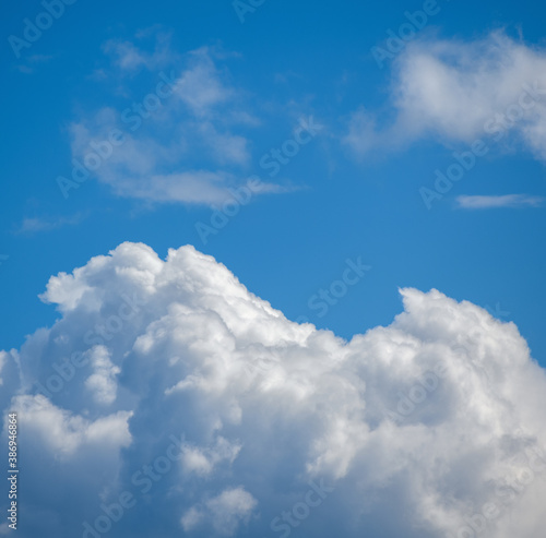 Beautiful blue sky with clouds. Natural background.