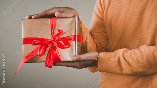 Portrait of a man with gift wrapping
