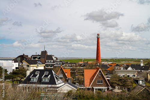 View on Huisduinen, lighthouse Lange Jaap and sea from the leaden roof of fortress Kijkduin