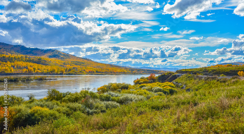 colorful autumn landscape on a Sunny day by the river in Transbaikalia