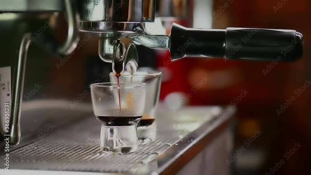 Espresso shots from coffee machine.
Creama coffee dropping from professional espresso machine ,hd video. Espresso shots from coffee machine.
Creama coffee dropping from professional espresso machine ,hd video.