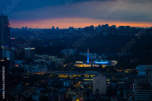 Photography Evening city sunset with rain clouds