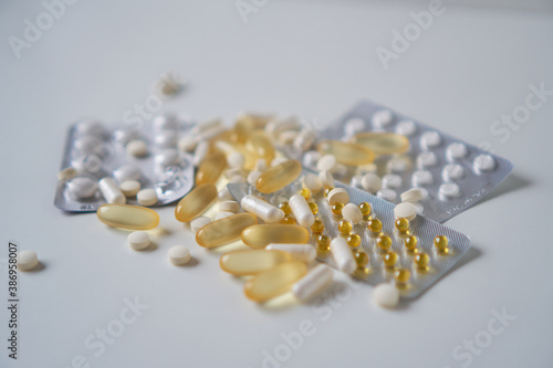 Assorted pharmaceutical medicine pills, tablets and capsules.