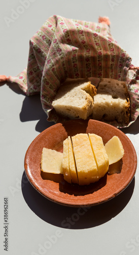 Traditional cured sheep cheese and bread from Alentejo region, Portugal
