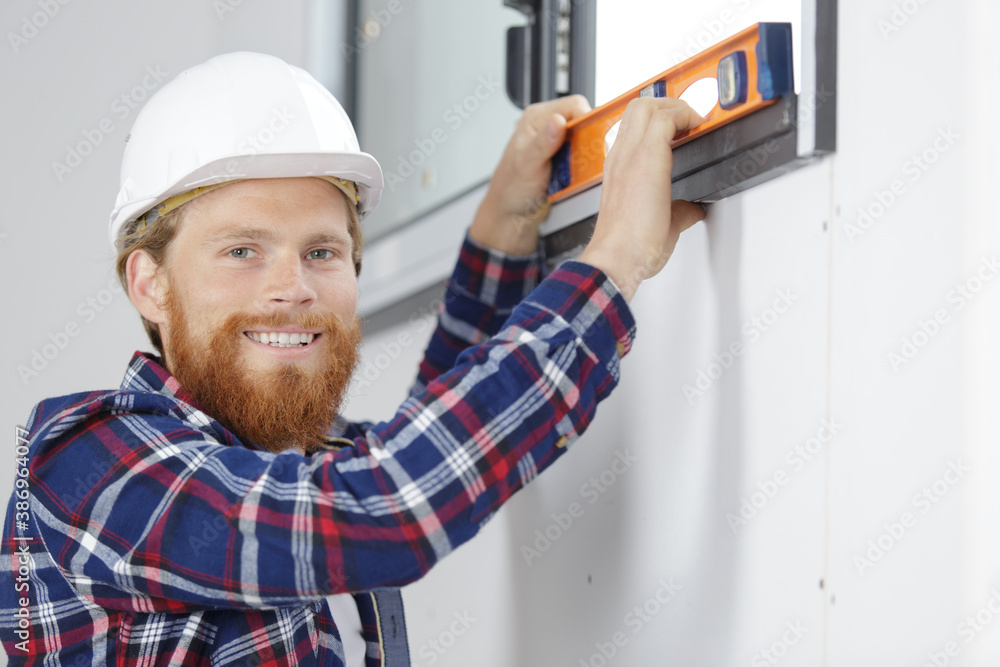 a specialist installing plastic windows a specialist installing plastic windows