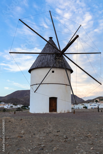 In Almeria approaching a mill in the town of the well of the friars in the Mediterranean Sea, in Cabo de Gata, in Spain.