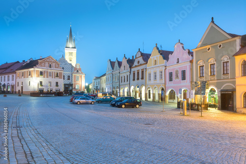 Traditional houses on the main square of Telc, South Moravia, Czech Republic. UNESCO heritage site. Town square in Telc with renaissance and baroque colorful houses. Early evening or night scene. © Michal