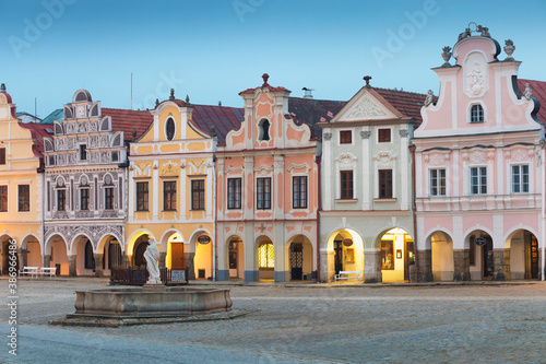 Traditional houses on the main square of Telc, South Moravia, Czech Republic. UNESCO heritage site. Town square in Telc with renaissance and baroque colorful houses. Early evening or night scene.