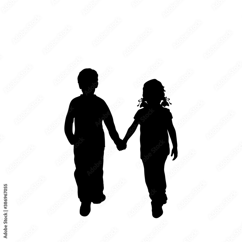Silhouettes of walking boy and girl from back