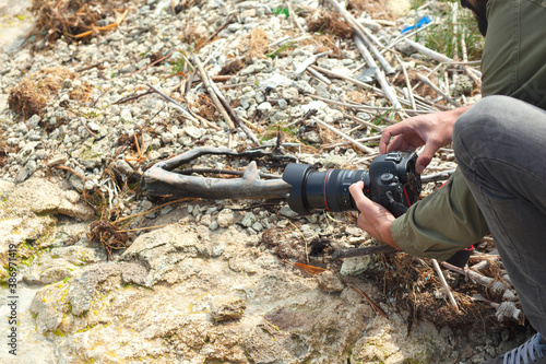 man is photographing the nature