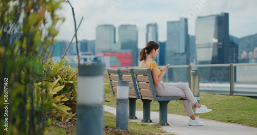 Photography Woman use of cellphone in city