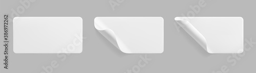 White glued crumpled stickers with curled corners mock up set. Blank white adhesive paper or plastic sticker label with wrinkled and creased effect. Template label tags close up. 3d realistic vector