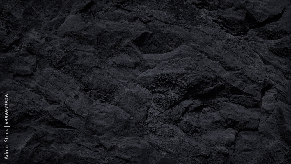 Dark stone background. Black rock texture. Close-up. Stone wall. Volumetric rough basalt granite surface. Dark stone background. Black rock texture. Close-up. Stone wall. Volumetric rough basalt granite surface.