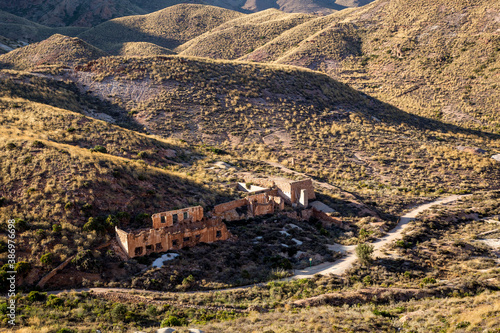 Panoramic view of industrial ruins near Cabo de Gata-Níjar Natural Park, Andalusia's largest coastal protected area, in southeastern Spain. Cabo de gata mountains