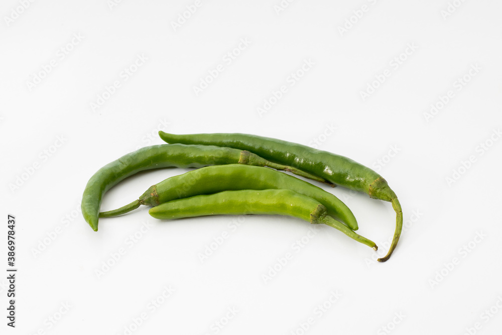 Isolated group of green chili peppers on white background Isolated group of green chili peppers on white background