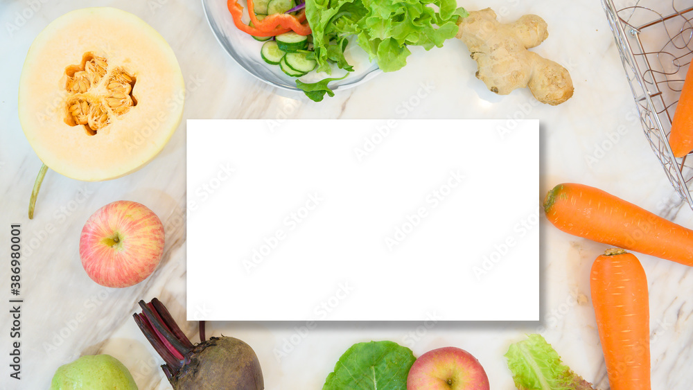 various fruits and vegetables with white paper card. Flat lay. Healthy eating concept. various fruits and vegetables with white paper card. Flat lay. Healthy eating concept.