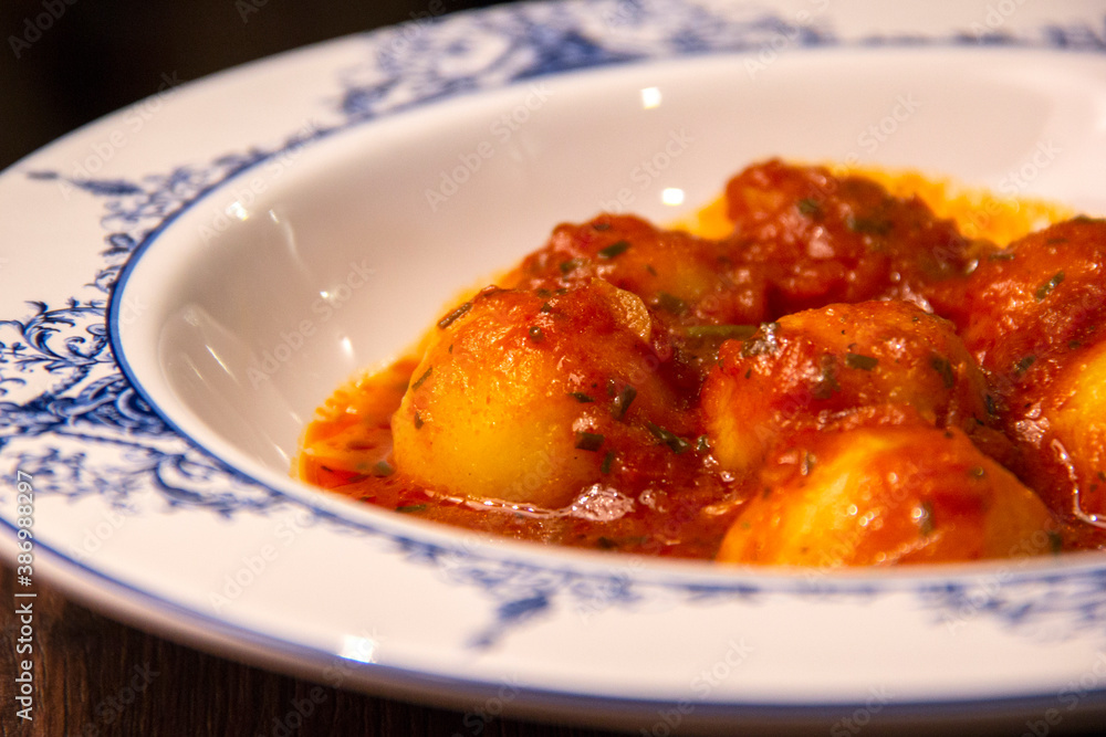 Homemade Italian potato gnocchi with tomato sauce Homemade Italian potato gnocchi with tomato sauce