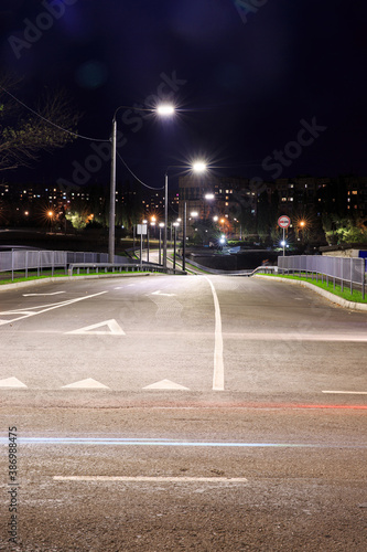 Night junction on the outskirts of the city . The photo was taken a long shutter speed.