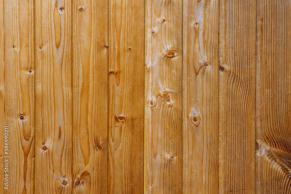 Fototapeta premium wood wall surface, wooden texture, vertical boards.