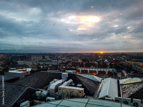 Photography Sunset over the roofs of Dublin at the evening