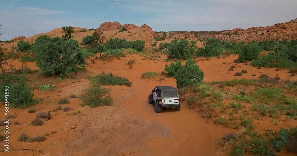 Off-roading Vehicle Driving in the Beautiful Deserts of Moab Utah Off-roading Vehicle Driving in the Beautiful Deserts of Moab Utah