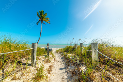 Blue sky over Smathers Beach entrance in Key West photo