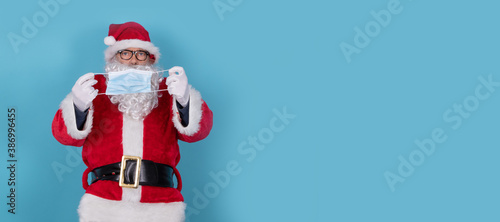 santa claus with sanitary mask isolated on background