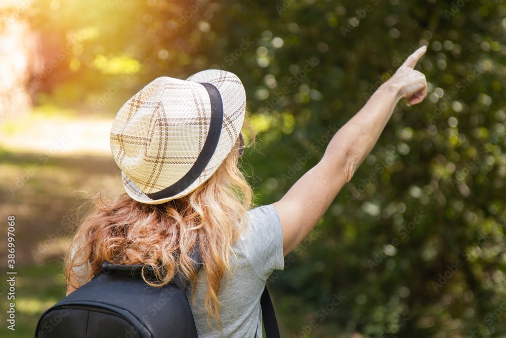 travel or excursion woman with map and backpack travel or excursion woman with map and backpack